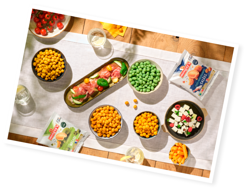 Assortiment de cacahuètes enrobées Menguy's pour un moment convivial.